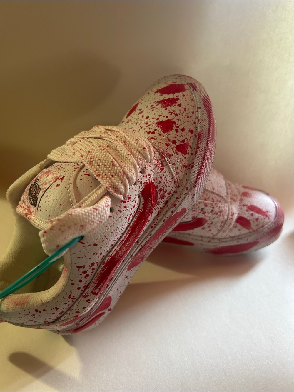 Vans Halloween Sneakers with Red Splatter Accents